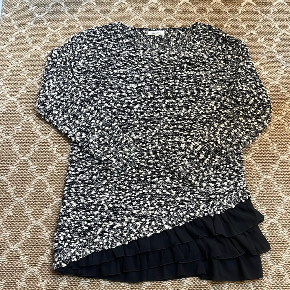 Beautiful knit sweater with ruffle accent. Size small/medium - like new!